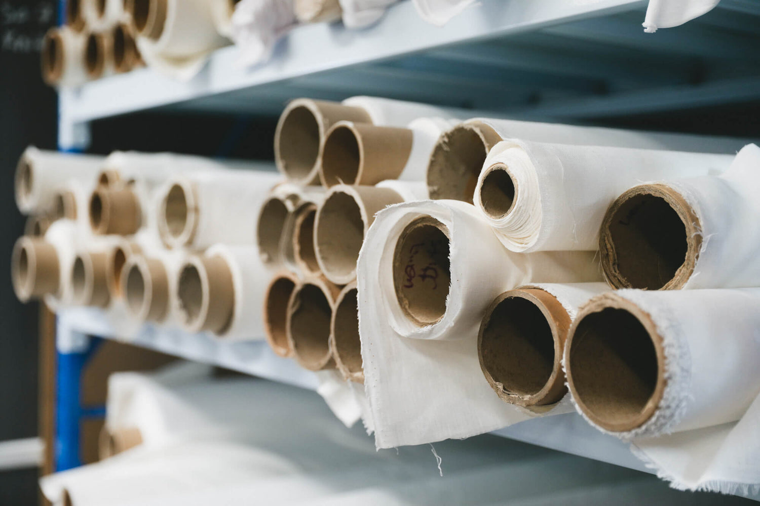 Rolls of premium base fabrics at APPLiK digital fabric printing Brisbane.