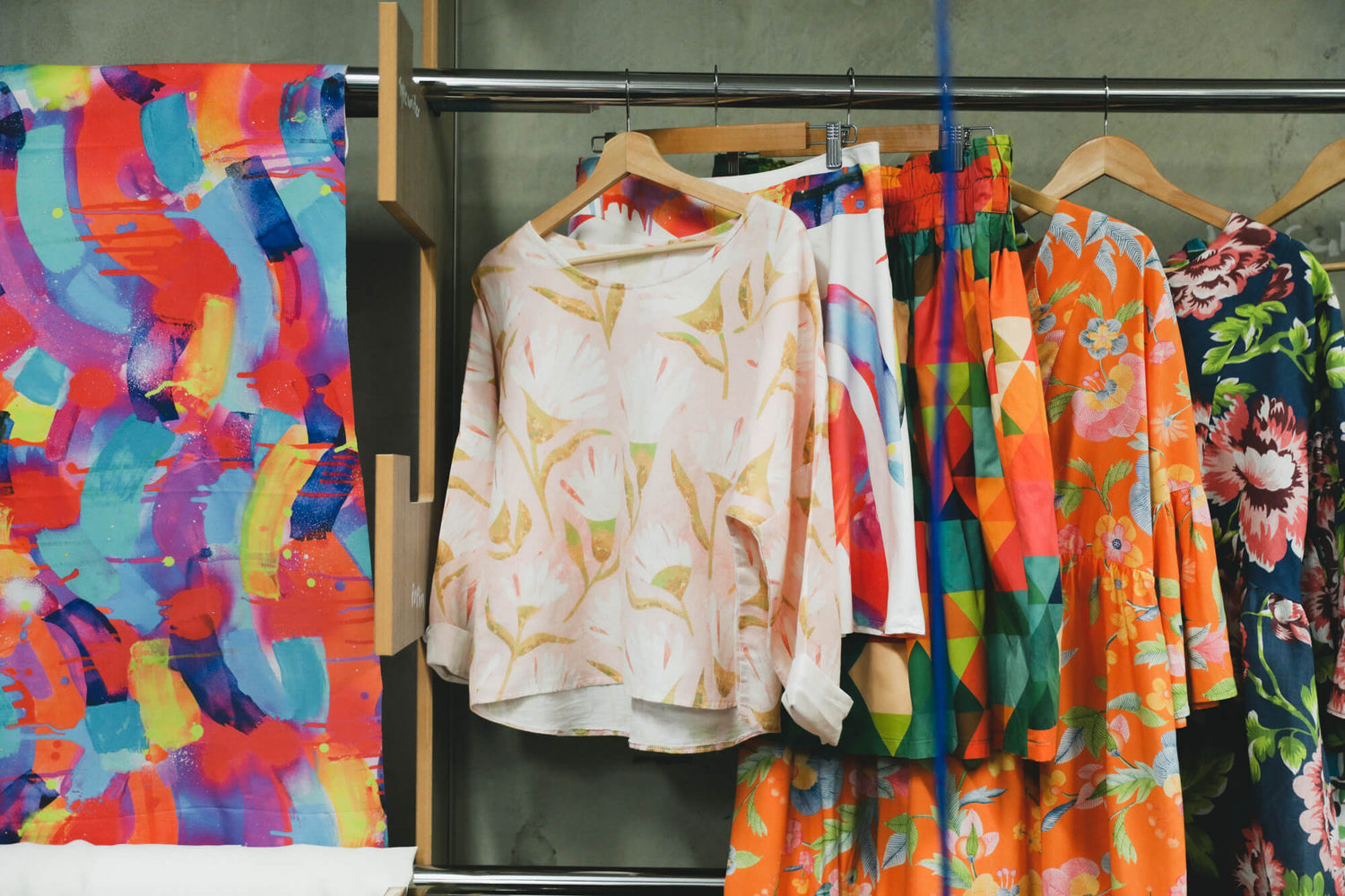 Clothing made with bright digitally printed fabric at APPLiK Brisbane.